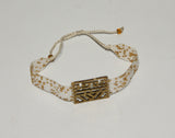 Bracelet with gold look plate