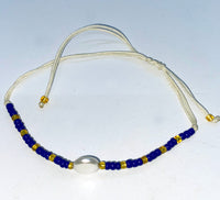 Bracelet with Beads and Pendant from Shell