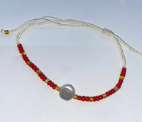 Bracelet with Beads and Pendant from Shell