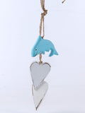 Hanging dolphin with hearts