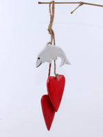 Hanging dolphin with hearts