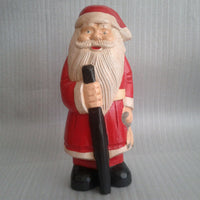 Father Christmas With stick and bag