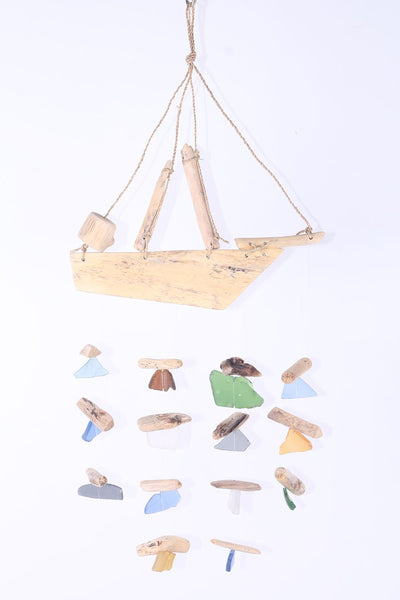 Hanging boat with beach glass
