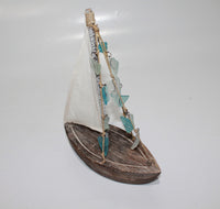 Boat with Sail form beach Glass